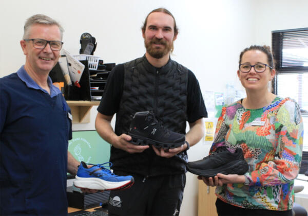 The walking company group photo with shoes